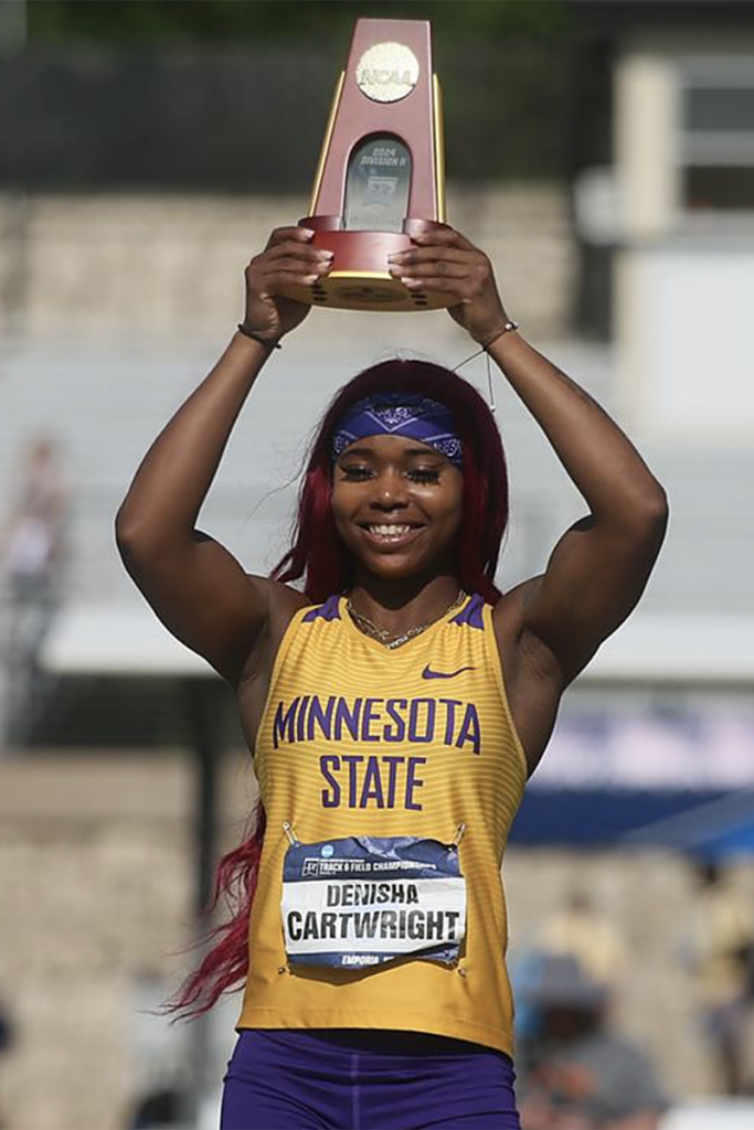 Denisha Cartwright lifting national NCAA DII individual trophy